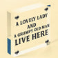 A Lovely Lady And A Grumpy Old Man Live Here Novelty Wooden Plaque Gift Sign