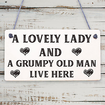 A Lovely Lady And A Grumpy Old Man Live Here Novelty Wooden Plaque Gift Sign