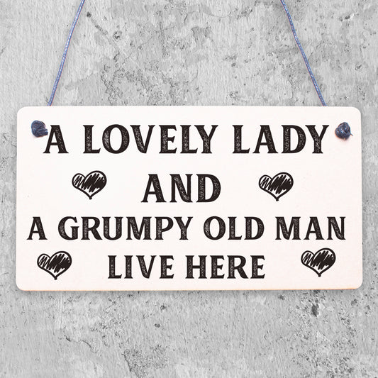 A Lovely Lady And A Grumpy Old Man Live Here Novelty Wooden Plaque Gift Sign